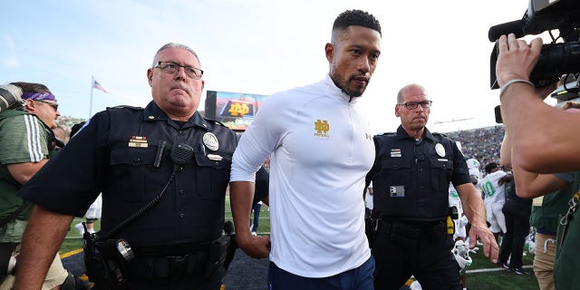 Notre Dame Fighting Irish head coach Marcus Freeman retires from the field after losing to Marshall Thundering Herd 26-21 at Notre Dame Stadium on September 10, 2022 in South Bend, Indiana.