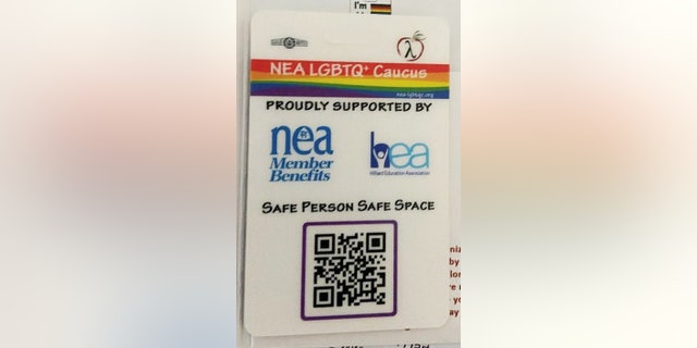 A photograph of the NEA LGBTQ+ Caucus badge that has been given to some educators in the Hilliard School District.