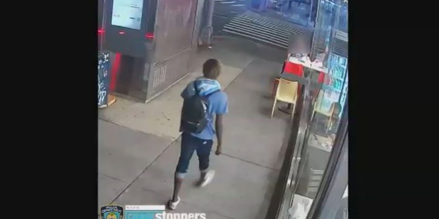 Back of a suspect just before they picked up a chair and threw it at a diner in New York City on Sept. 9, 2022.