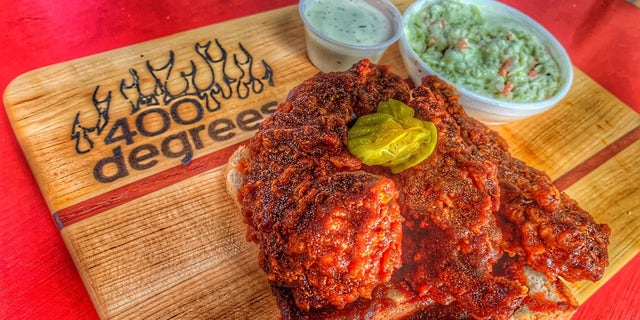 400 Degrees is a beloved hotspot for Nashville hot chicken, specializing in bone-in breast quarters. Nashville hot chicken sauce is a blend of cayenne paprika for heat, paprika for rich red color, and oil for texture and mouthfeel.