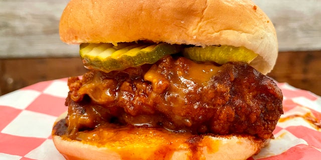Prince's Hot Chicken sandwich. Nashville hot chicken traces its roots to Thornton Prince, a Depression-era Nashville pig farmer and local lothario. A spurned lover attempted to punish him by over-spicing his fried chicken. He loved the new dish so much he began selling it.