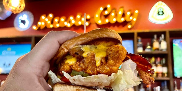 A Nashville hot chicken sandwich at Party Fowl. The Music City is also a poultry paradise, as Nashville hot chicken, a longstanding local tradition, has captured the attention of food lovers across the nation. 