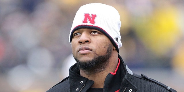 Former Nebraska player Ndamukong Suh watch the action from the sidelines during the game at Michigan Stadium on Nov. 19, 2011 in Ann Arbor, Michigan.