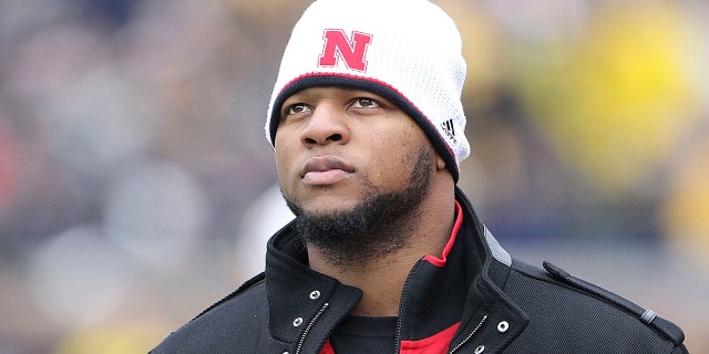 Former Nebraska player Ndamukong Suh watch the action from the sidelines during the game at Michigan Stadium on Nov. 19, 2011 in Ann Arbor, Michigan.