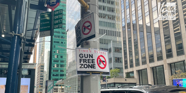 Signs read "Gun Free Zone" in New York City's Manhattan borough. 