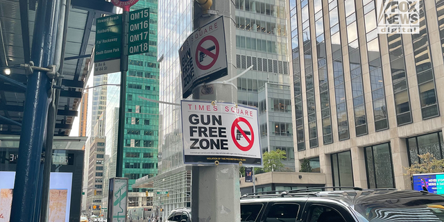 Signs read "Gun Free Zone" in New York City's Manhattan borough. 