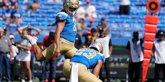 UCLA player Nicholas Barr-Mira, No. 2, hits a field goal to win an NCAA college football game against South Alabama in Pasadena, Calif., Saturday, September. 17, 2022.