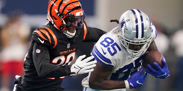 Dallas Cowboys wide receiver Noah Brown is tackled by Cincinnati Bengals cornerback Eli Apple Sunday, Sept. 18, 2022, in Arlington, Texas.