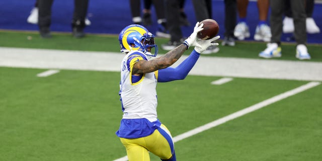 Odell Beckham Jr. of the Los Angeles Rams catches a pass against the Cincinnati Bengals during the Super Bowl at SoFi Stadium Feb. 13, 2022, in Inglewood, Calif. 