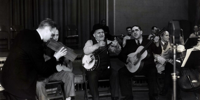 Broadcaster George Hay (left) with performers Uncle Dave Macon and Paul Warmack on an early WSM broadcast.