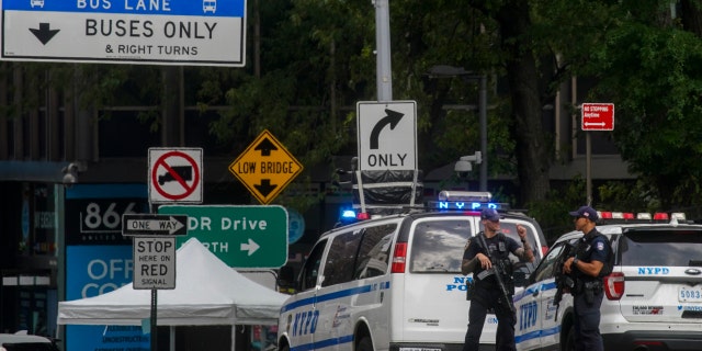 NEW YORK - NEW YORK - SEPTEMBER 19: NYPD officers stand guard near the United Nations headquarters during the start of the United National General Assembly on September 19, 2022, in New York. 