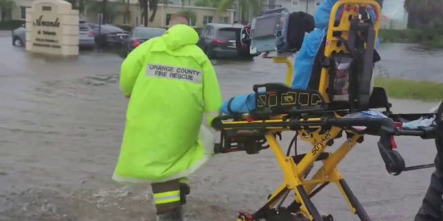 Orange County Fire Rescue evacuated seniors from the Avante nursing home in Orlando, Fla., due to rising floodwaters Thursday.