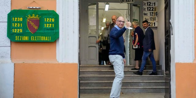Democratic Party's leader Enrico Letta arrives at a polling station in Rome, Sunday, Sept. 25, 2022. Italians were voting on Sunday in an election that could move the country's politics sharply toward the right during a critical time for Europe, with war in Ukraine fueling skyrocketing energy bills and testing the West's resolve to stand united against Russian aggression. (AP Photo/Gregorio Borgia)