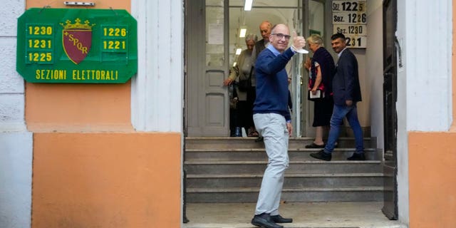 Democratic Party's leader Enrico Letta arrives at a polling station in Rome, Sunday, Sept. 25, 2022. Italians were voting on Sunday in an election that could move the country's politics sharply toward the right during a critical time for Europe, with war in Ukraine fueling skyrocketing energy bills and testing the West's resolve to stand united against Russian aggression. (AP Photo/Gregorio Borgia)