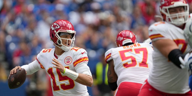 Kansas City Chiefs quarterback Patrick Mahomes, #15, draws back for a pass during a game against the Indianapolis Colts at Lucas Oil Stadium in Indianapolis Sept. 25, 2022. 