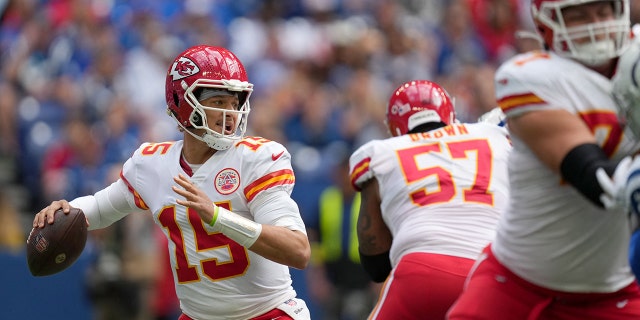 Kansas City Chiefs quarterback Patrick Mahomes, #15, draws back for a pass during a game against the Indianapolis Colts at Lucas Oil Stadium in Indianapolis Sept. 25, 2022. 