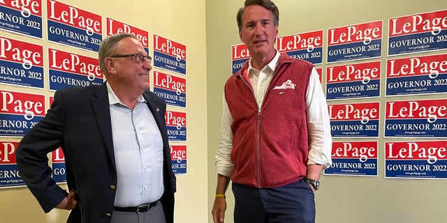 Republican Gov. Glenn Youngkin of Virginia (right) and former Maine Gov. Paul LePage (left), the 2022 GOP gubernatorial nominee in Maine, speak with reporters, on Sept. 7, 2022 in Lewiston, Maine.