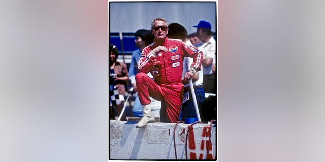 Whether he was watching or driving, Paul Newman attempted to keep a low profile as "P.L. Newman."