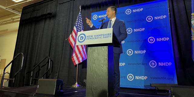 Transportation Secretary Pete Buttigieg addresses the New Hampshire Democratic Party’s Eleanor Roosevelt Dinner, which is the state party’s largest annual fundraising event, on Sept. 24, 2022, in Manchester, New Hampshire.