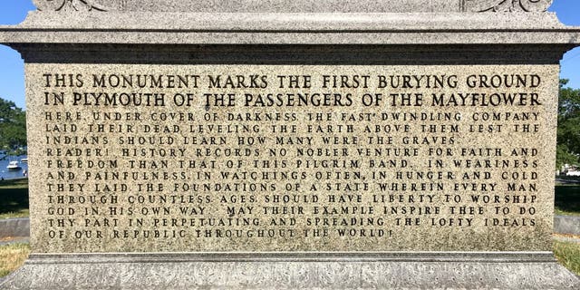 A monument overlooking the harbor in Plymouth, Massachusetts, marks the site where the Pilgrims buried their dead the first winter of 1620-21, when nearly half of the 100 settlers died. "In hunger and cold they laid the foundations of a state wherein every man through countless ages should have liberty to worship God in his own way," reads the monument. 