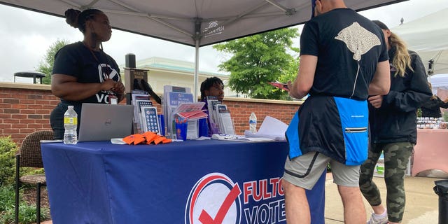 False claims, threats fuel poll worker sign-ups for midterms
