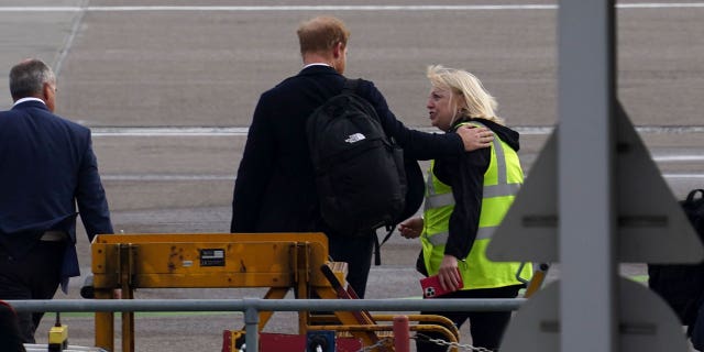 Prince Harry arrives at the Aberdeen airport as he likely heads for London.