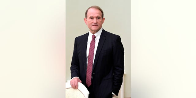 Chairman of Ukraine’s pro-Russian Opposition Platform-For Life party Viktor Medvedchuk stands as he waits to meet Russian President Vladimir Putin in the Kremlin in Moscow Tuesday, March 10, 2020.