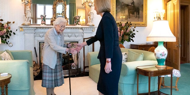 Queen Elizabeth II greets newly elected leader of the Conservative Party Liz Truss as she arrives at Balmoral Castle for an audience where she was to be invited to become prime minister and form a new government on Sept. 6, 2022, in Aberdeen, Scotland. The queen died on Sept. 8, 2022.