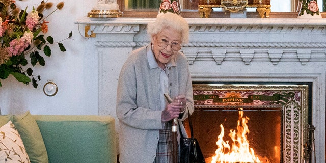 Britain's Queen Elizabeth II waits in the Drawing Room before receiving Liz Truss for an audience at Balmoral, in Scotland, Tuesday, Sept. 6, 2022.