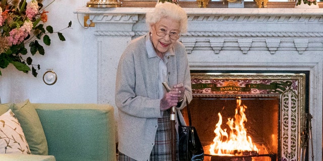 Britain's Queen Elizabeth II waits in the Drawing Room before receiving Liz Truss for an audience at Balmoral, in Scotland, Tuesday, Sept. 6, 2022.