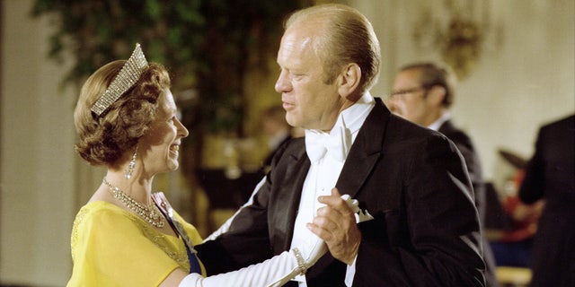 US President Gerald Ford and Britain's Queen Elizabeth dance at the state banquet honoring The Queen and Prince Philip at the White House, Washington, USA, July 7, 1976.  (Ricardo Thomas/Gerald R. Ford Presidential Library/US National Archives and Records Management/Distribution via REUTERS)