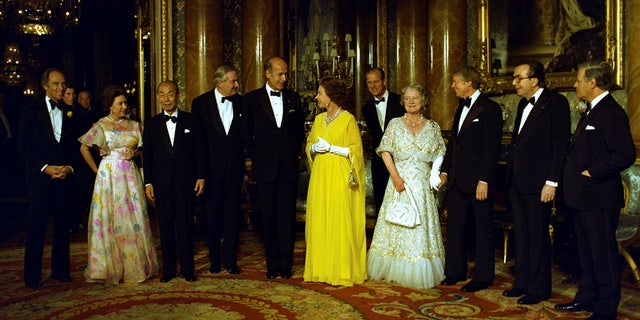 Queen Elizabeth II meets President Jimmy Carter and other heads of state at a 1977 summit at Buckingham Palace. (Jimmy Carter Presidential Library and Museum/National Archives and Records Administration)
