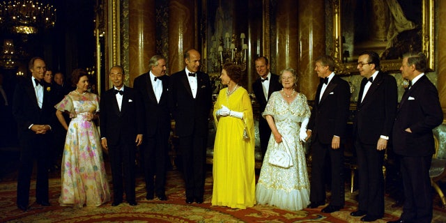 Queen Elizabeth II meets President Jimmy Carter and other heads of state at a 1977 summit at Buckingham Palace. (Jimmy Carter Presidential Library and Museum/National Archives and Records Administration)