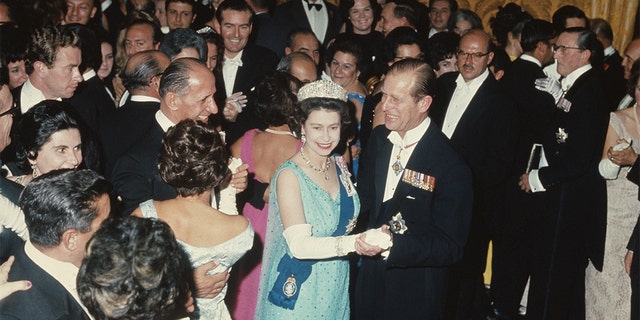 Queen Elizabeth II and Prince Philip dance at the State Ball at the Palace in Valletta during a Commonwealth visit to Malta, November 16, 1967.