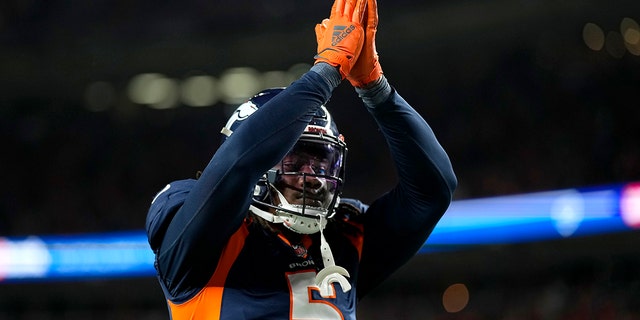 Denver Broncos linebacker Randy Gregory (5) gestures after San Francisco 49ers quarterback Jimmy Garoppolo was called for a safety during the second half of an NFL football game in Denver, Sunday, Sept. 25, 2022.
