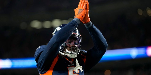 Denver Broncos linebacker Randy Gregory (5) gestures after San Francisco 49ers quarterback Jimmy Garoppolo was called for a safety during the second half of an NFL football game in Denver, Sunday, Sept. 25, 2022.