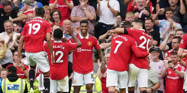 Manchester United celebrate after scoring the second goal against Arsenal in Manchester, England, Sunday 4 September 2022.