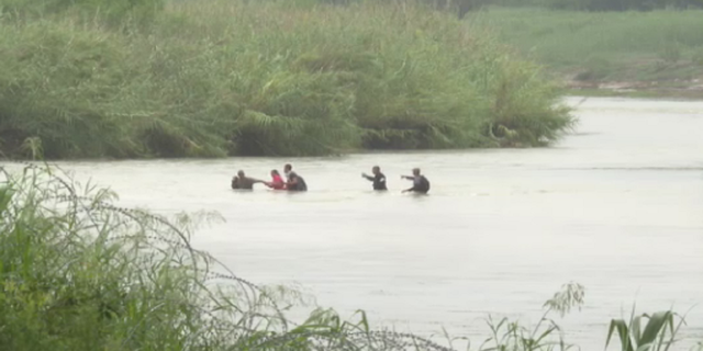 Migrants are seen crossing the Rio Grande River near Eagle Pass, Texas, on Sept. 3, two days after the massive crossing that led to deaths.