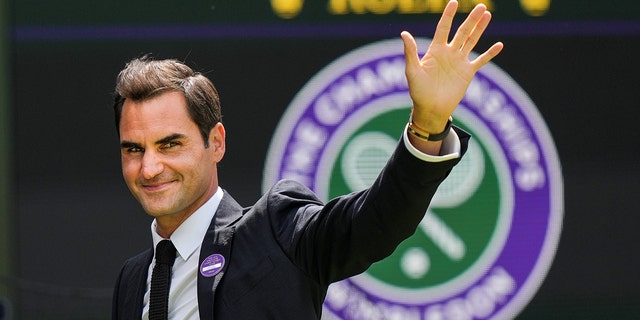 Roger Federer, of Switzerland, greets the audience during the Centre Court Centenary Celebration during day seven of The Championships Wimbledon 2022 at All England Lawn Tennis and Croquet Club on July 03, 2022, in London.