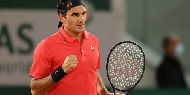 Roger Federer of Switzerland celebrates his victory during the men's singles third round match against Germany's Dominique Koepfer on the seventh day of the 2021 French Open at Roland Garros on June 5, 2021 in Paris.