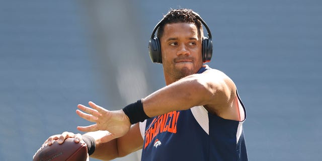 Russell Wilson #3 of the Denver Broncos warms up before playing against the Seattle Seahawks at Lumen Field on September 12, 2022 in Seattle, Washington.