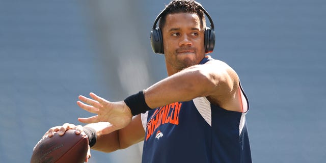 Russell Wilson #3 of the Denver Broncos warms up before playing against the Seattle Seahawks at Lumen Field on September 12, 2022 in Seattle, Washington.