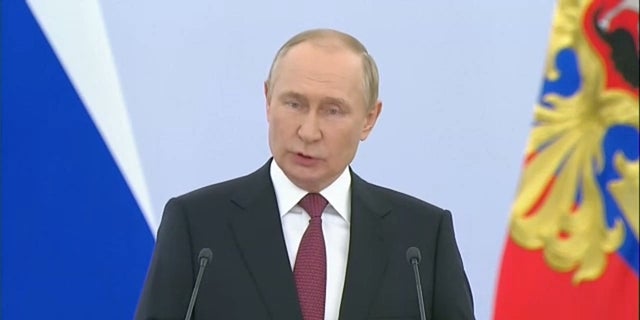 Russian President Vladimir Putin delivers a speech as he formalizes the annexation of four Ukrainian territories, Friday, Sept. 30, 2022.