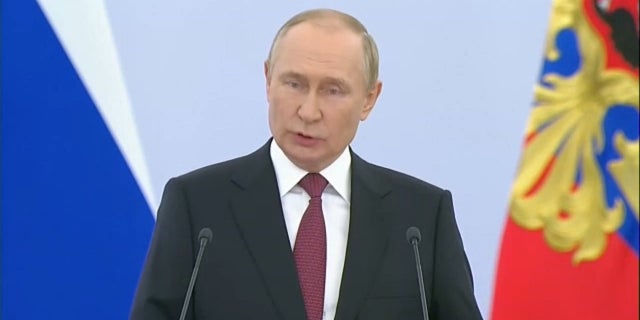 Russian President Vladimir Putin delivers a speech as he formalizes the annexation of four Ukrainian territories Sept. 30, 2022.