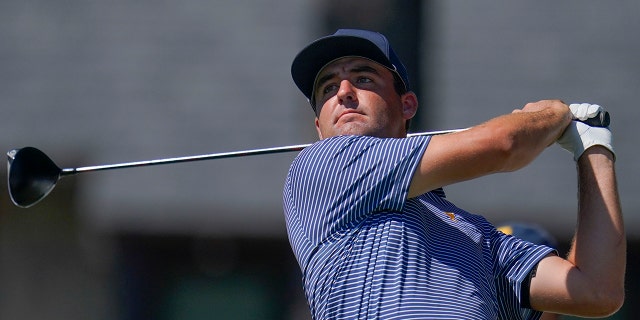 Scottie Scheffler drives from the fifth tee during practice for the Presidents Cup golf tournament at the Quail Hollow Club, Wednesday, Sept. 21, 2022, in Charlotte, North Carolina. 