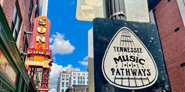Downtown Nashville is the heart of Tennessee Music Pathways, a 1,200-mile system that celebrates and highlights locations that have made major contributions to the state's musical legacy. This sign is located outside The Johnny Cash Museum on Third Avenue South. 