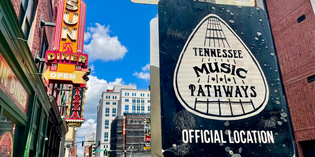 Downtown Nashville is the heart of Tennessee Music Pathways, a 1,200-mile system that celebrates and highlights locations that have made major contributions to the state's musical legacy. This sign is located outside The Johnny Cash Museum on Third Avenue South. 