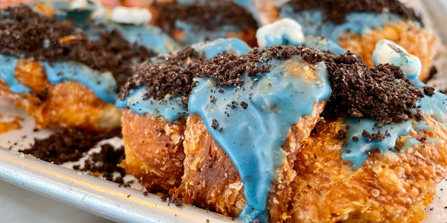 Parlor Donuts in Nashville offers an incredible array of delicious and colorful breakfast treats, including its Cookie Monster donuts with blue frosting and white marshmallow eyes.