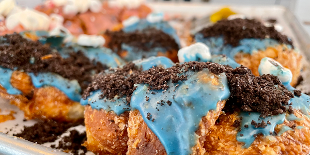 Parlor Donuts in Nashville offers an incredible array of delicious and colorful breakfast treats, including its Cookie Monster donuts with blue frosting and white marshmallow eyes.