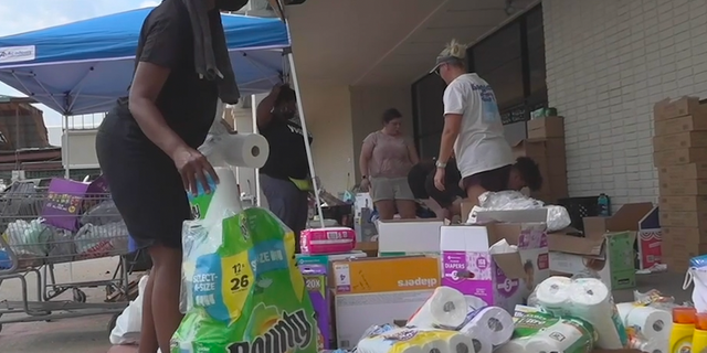 Free supplies are handed out in Lafourche Parish after Hurricane Ida.